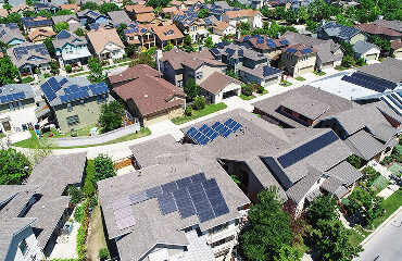 neighborhood filled with solar panels